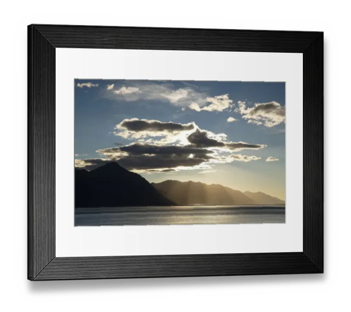 Framed Print : Sun shining behind clouds above Turnagain Arm, outside Anchorage, Alaska, United States Framed Print : Sun shining behind clouds above Turnagain Arm, outside Anchorage, Alaska, United States