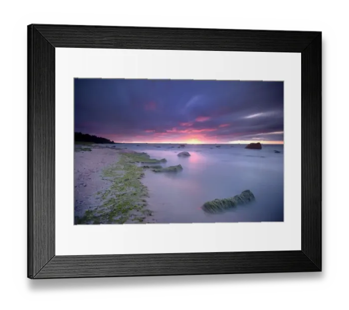 Framed Print : A sunset over the Gulf of Finland at the coast of Lahemaa National Park with boulders Framed Print : A sunset over the Gulf of Finland at the coast of Lahemaa National Park with boulders