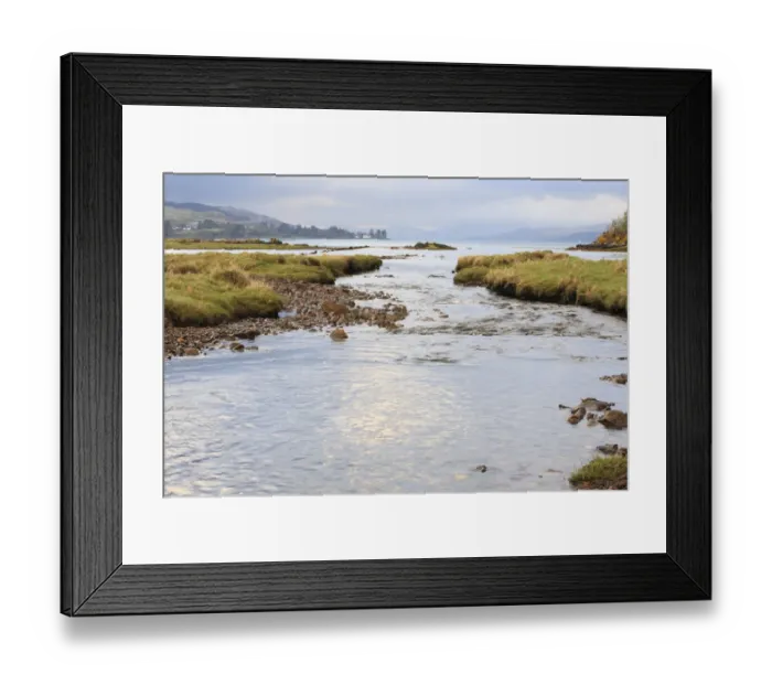Framed Print : View of meandering river flowing through grassland with hills at background, Isle of Mull Framed Print : View of meandering river flowing through grassland with hills at background, Isle of Mull
