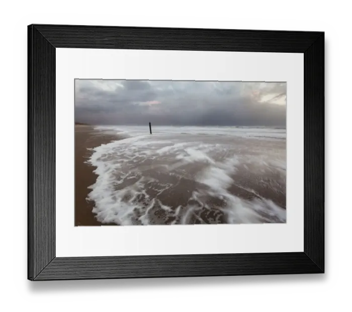 Framed Print : Foam on North Sea beach at stormy winter day, North Sea beach, the Netherlands Framed Print : Foam on North Sea beach at stormy winter day, North Sea beach, the Netherlands