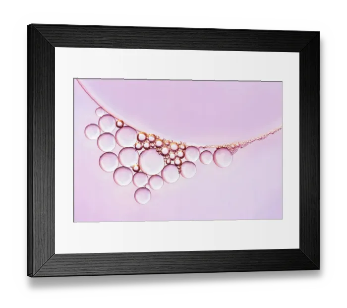 Framed Print : Necklace of water drops against a pink background Framed Print : Necklace of water drops against a pink background