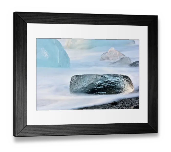 Framed Print : Long exposure image of crystal clear iceberg formations on the volcanic beach, Jokulsarlon, Iceland Framed Print : Long exposure image of crystal clear iceberg formations on the volcanic beach, Jokulsarlon, Iceland