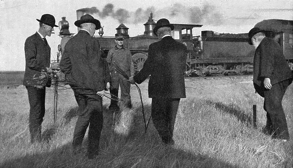 Water dowser and steam train, 1907