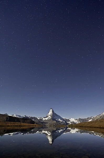 Switzerland, Valais, Starry sky above the Matterhorn