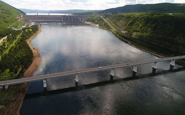 An aerial view shows a bridge across the Yenisei River near the Krasnoyarsk hydro