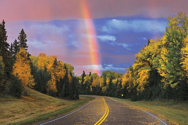Canada, Saskatchewan, Prince Albert National Park. Rainbow after storm. Credit as
