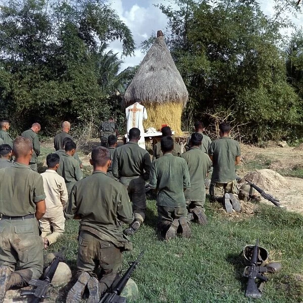 VIETNAM WAR, 1966. Chaplain Bruno Massoti conducting prayer services for troops