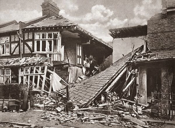 WORLD WAR I: HOUSE BOMBED. A German bomb dropped during an air raid destroyed this home
