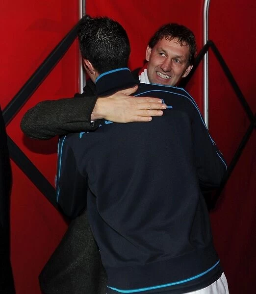 Arsenal Legends: Tony Adams Embraces Robin van Persie Before Arsenal vs. Queens Park Rangers, 2011-12