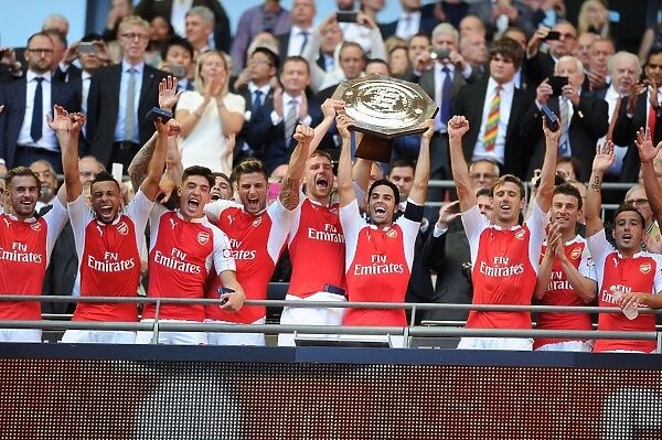 Arsenal Players Celebrate FA Community Shield Victory over Chelsea