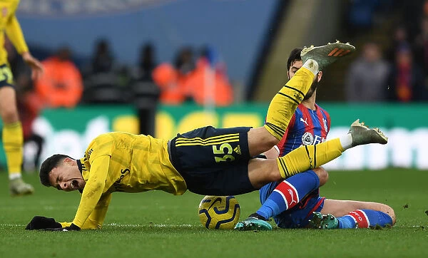 Intense Clash: Gabriel Martinelli Fouls by Tomkins in Arsenal vs. Crystal Palace, Premier League 2019-2020