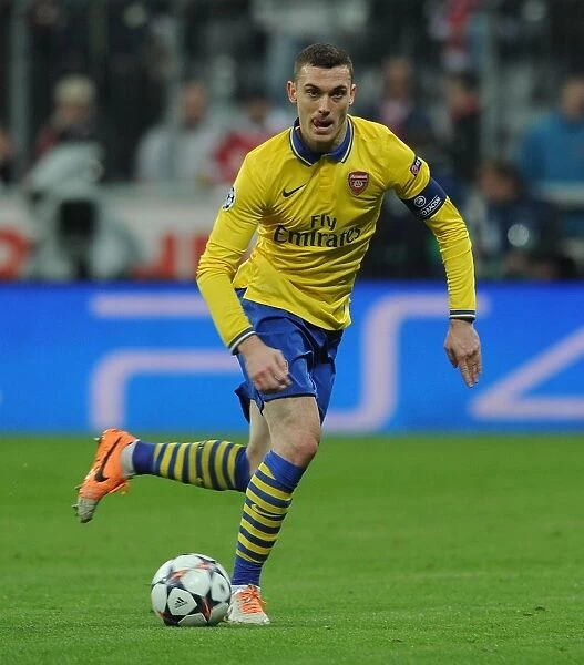 Thomas Vermaelen's Determined Performance in Arsenal's UEFA Champions League Battle at Allianz Arena (2013-14)