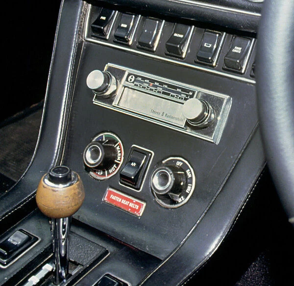 1974 Jensen Interceptor dashboard showing 8 track cartridge sound system. Creator: Unknown