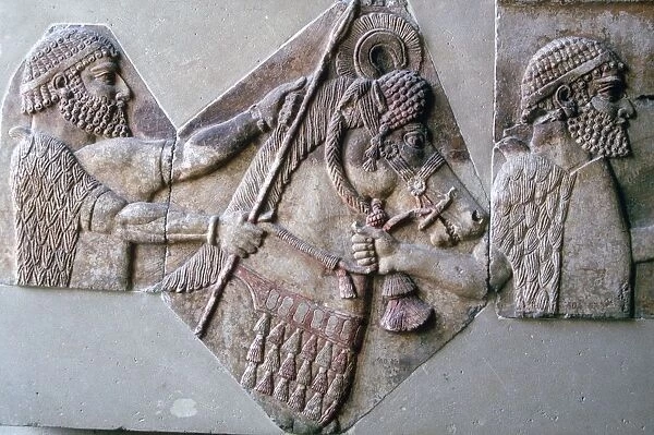 Assyrian relief of a man leading a horse and rider