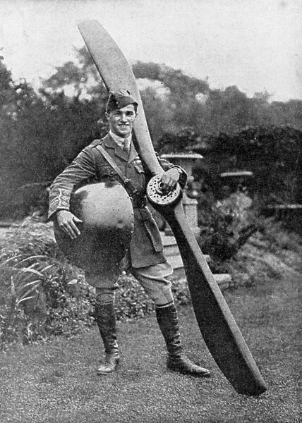 British pilot Captain Albert Ball posing with trophies from his 43rd victory, 1917