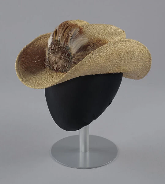 Straw cowboy hat with feathered hat band worn by Arthur Lee, ca. 2000. Creator: Unknown