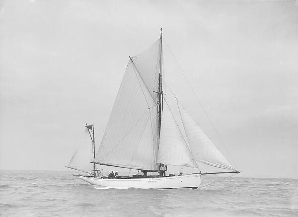 The yawl Colleen under way, 1912. Creator: Kirk & Sons of Cowes