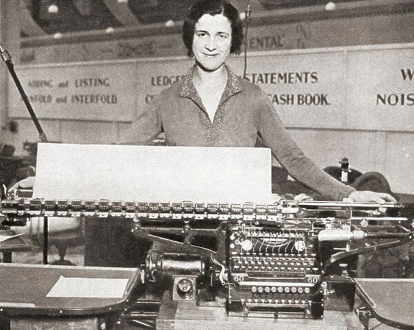 The worlds largest typewriter on display at the Business Efficiency Exhibition, White City, London, England in 1931. From The Pageant of the Century, published 1934