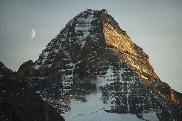 Crescent moon and summit of Mount Assiniboine, Mount Assiniboine Provincial Park, British Columbia