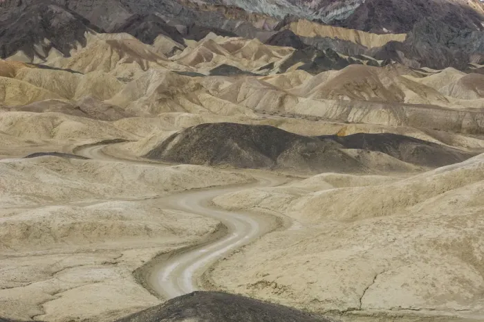 Framed Print : Dirt road winding through rock formations, Twenty Mule Team Canyon, Death Valley National Park Framed Print : Dirt road winding through rock formations, Twenty Mule Team Canyon, Death Valley National Park