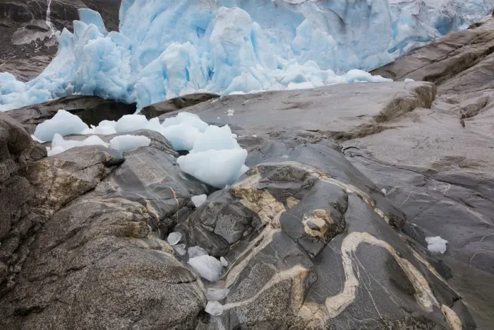 Framed Print : end of Nigardsbreen glaciar with ice on rocks, Nigardsbreen, Norway Framed Print : end of Nigardsbreen glaciar with ice on rocks, Nigardsbreen, Norway