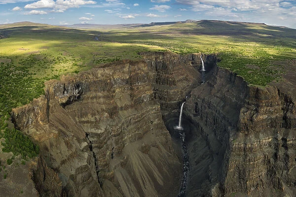Waterfalls in deep canyon in plateau, Putorana Plateau, Siberia, Russia