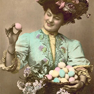 Lady with a basket full of decorated Easter eggs