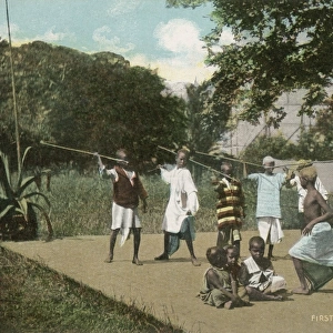 Somali boys practicing spear throwing