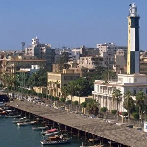 Waterfront skyline with lighthouse, Port Said, Egypt, North Africa, Africa