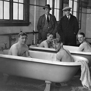 Aston Villa bathe in the changing rooms baths after a training session in 1923 / 4