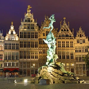 The Brabo Fountain in the Grote Markt at night in Antwerp, Belgium