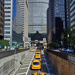 MetLife Building and yellow taxi cabs, New York. America