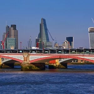 River Thames with Blackfriars Bridge and the City of London skyline in London, England