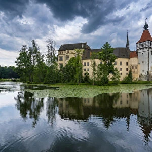 Reflection of Blatna Castle in pond, Blatna, Strakonice District, South Bohemian Region, Czech Republic
