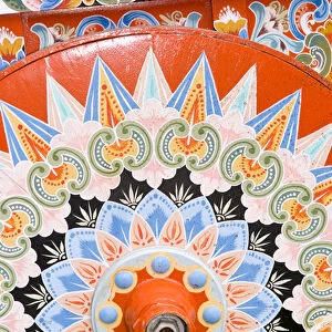 Colorful close up of famous wheel for carriages that are traditional in and around