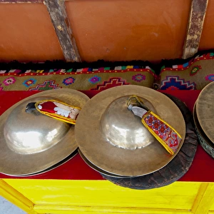 India, Jammu & Kashmir, Ladakh, three sets of brass cymbals at Hemis Monastery