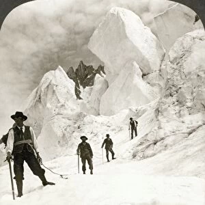 ALPINE MOUNTAINEERS, 1908. Ascent of Mont Blanc, passing enormous ice cliffs at