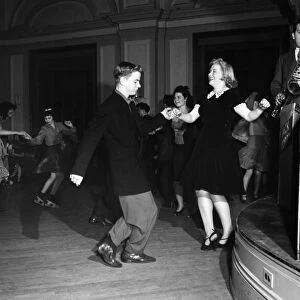 Couples dancing the Jitterbug at and Elks Club dance in Washington, D. C. Photograph by Esther Bubley, April 1943