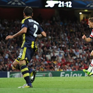 Aaron Ramsey Scores Past Volkan Demirel: Arsenal's Victory in Champions League Play-offs vs Fenerbahce (2013)
