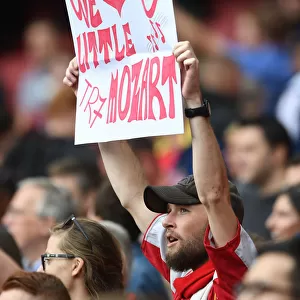 Arsenal Fan Cheers on Arsenal Legends vs Real Madrid Legends at Emirates Stadium
