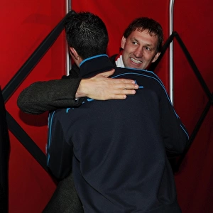 Arsenal Legends: Tony Adams Embraces Robin van Persie Before Arsenal vs. Queens Park Rangers, 2011-12