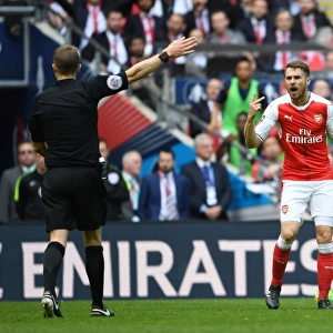 Arsenal's Aaron Ramsey Protests to Referee during FA Cup Semi-Final vs Manchester City