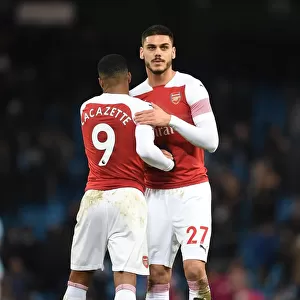 Arsenal's Lacazette and Mavropanos Reunite after Manchester City Clash - Premier League 2018-19