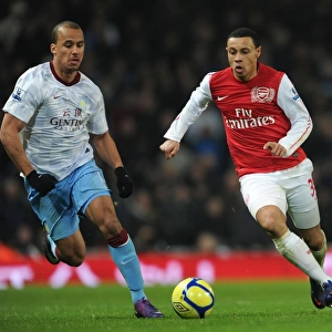 Coquelin vs. Agbonlahor: A Midfield Battle of Intensity in Arsenal's FA Cup Clash against Aston Villa
