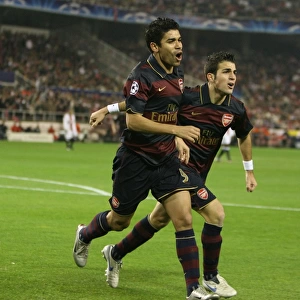 Eduardo celebrates scoring the Arsenal goal with Cesc Fabregas