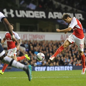 Flamini's Brace: Arsenal Defeats Tottenham in Capital One Cup