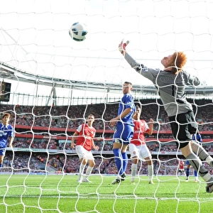 Marouane Chamakh heads past Bolton goalkeeper Adam Bogdan to score the 2nd Arsenal goal