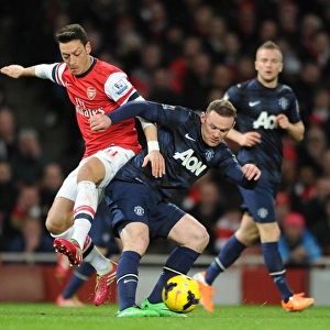 Mesut Ozil (Arsenal) Watne Rooney (Man Utd). Arsenal 0: 0 Manchester United. Barclays Premier League