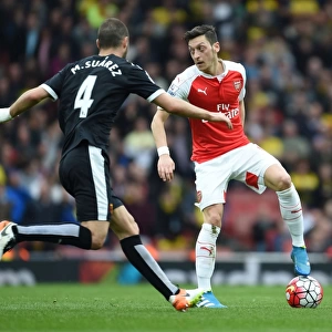 Mesut Ozil vs. Mario Suarez: A Premier League Showdown at Arsenal vs. Watford