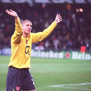 Philippe Senderos (Arsenal) claps the fans at the end of the match